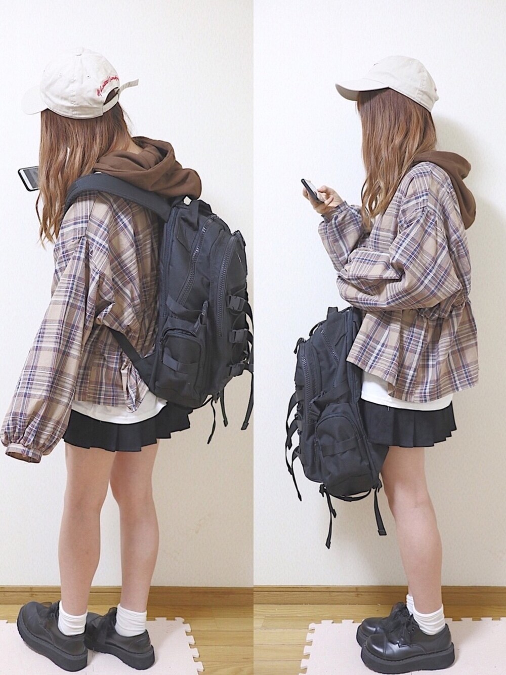 ブラック系のバックパック/リュック、ブラウン系のシャツ/ブラウス、ブラウン系のパーカーを着用したレディースの秋コーディネートの1枚目の写真