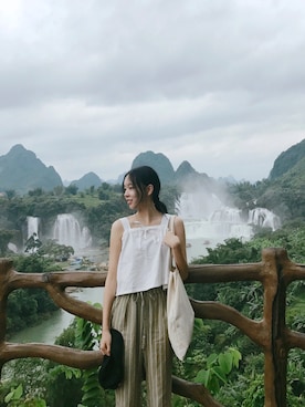 「travel」｜「アイテム（スラックス）」を使った、左乙 Angela  Zuo さん（レディース・163cm）の冬コーディネート