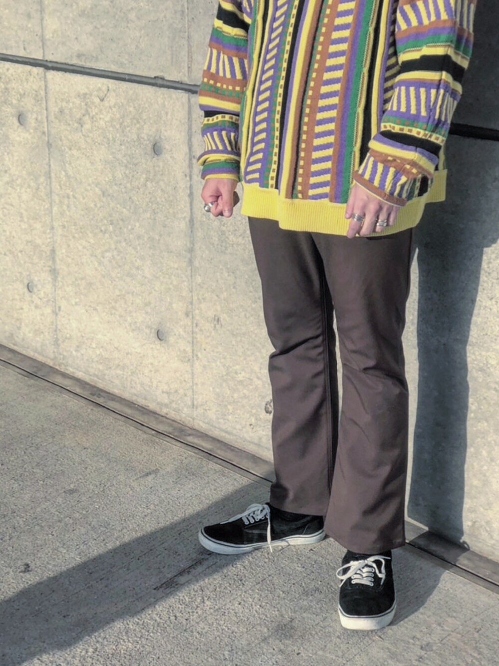 「主役はカラーパンツ、フレアパンツ、ニット、総柄、VANS、ブラウン、イエロー、ビッグシルエット、春コーデ、おしゃれさんと繋がりたい」｜「SELF MADE BY GIANFRANCO VILLEGASのアイテム（ニット/セーター、その他）」を使った、daiさん（メンズ・180cm）の春コーディネートの1枚目の写真
