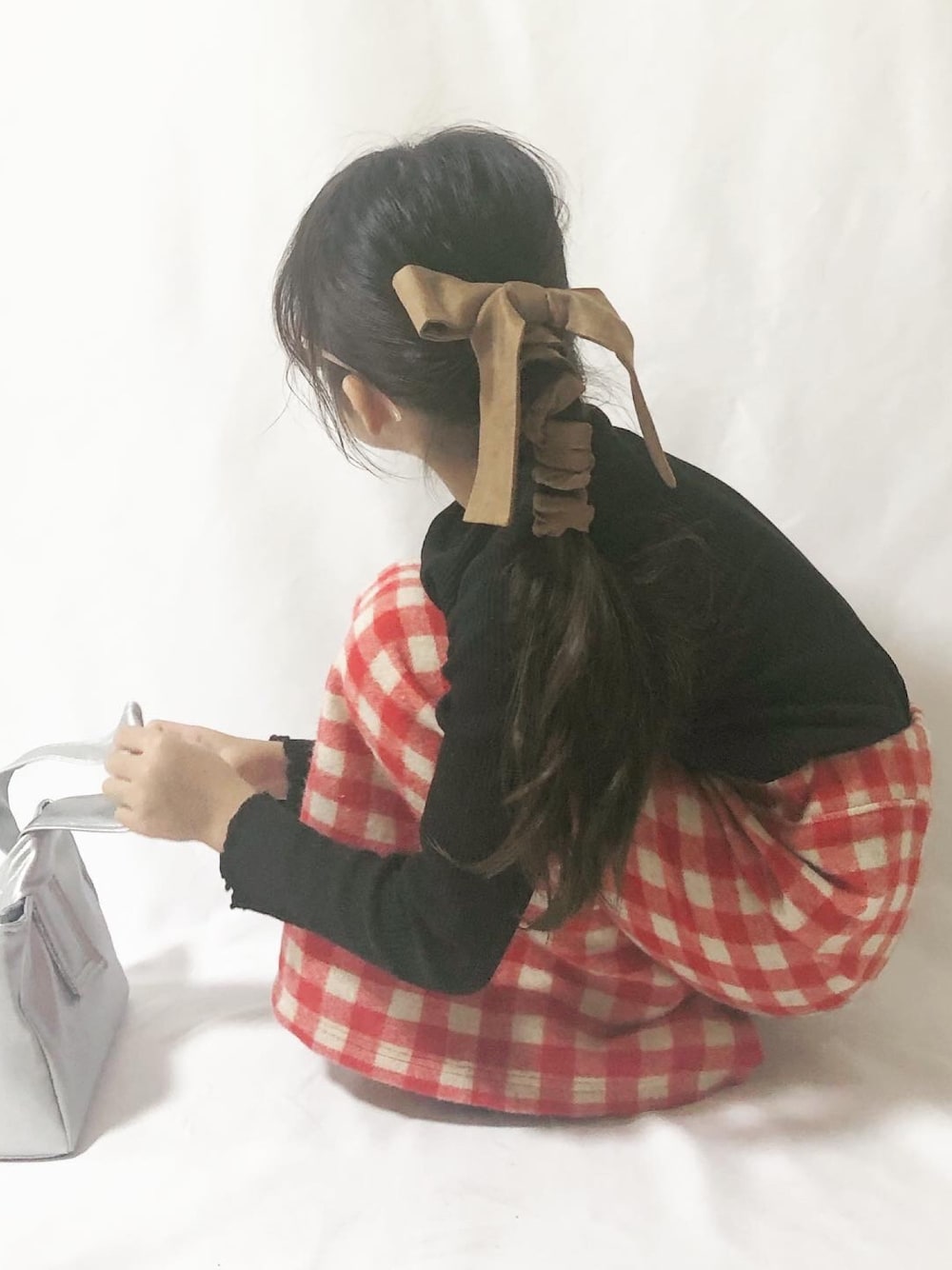 「GU、秋服準備はじめました、ギンガムチェック、スカートスタイル、kids、タイトスカート、ポニーテール＋リボン、ポニーテール、ヘアアレンジ、キッズコーデ」｜「Handmadeの作りました♡（スカート、レッド系）」を使った、kokkoさん（キッズ・120cm）の秋コーディネートの1枚目の写真