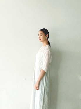 秦麻里子さんのコーディネート
