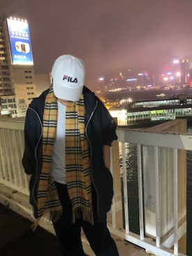 「FILA（フィラ）のアイテム（キャップ）」を使った、Holam Cheungさん（メンズ・173cm）の冬コーディネート