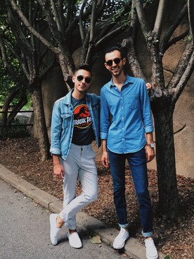 Alex & Mike is wearing Calvin Klein "Vintage Light Blue Denim Trucker Jacket"