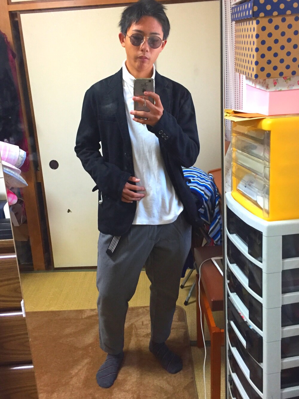 「UNIQLOのアイテム（ニット/セーター、ホワイト系）」を使った、yuyaさん（メンズ・165cm）の冬コーディネートの1枚目の写真
