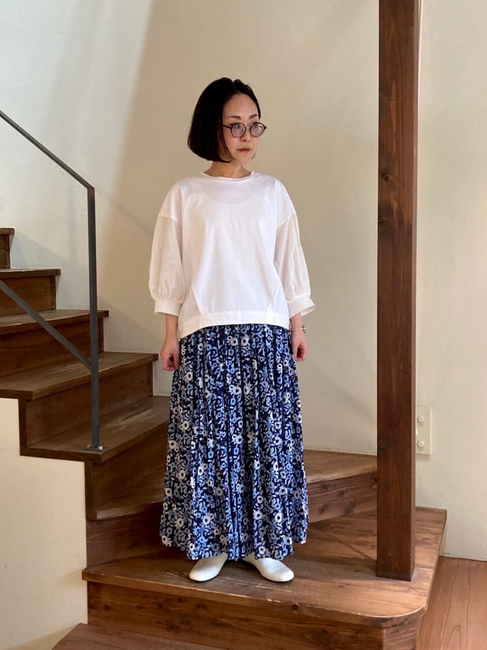 yuni（ユニ ）の「gradation flowerプリントタックギャザースカート