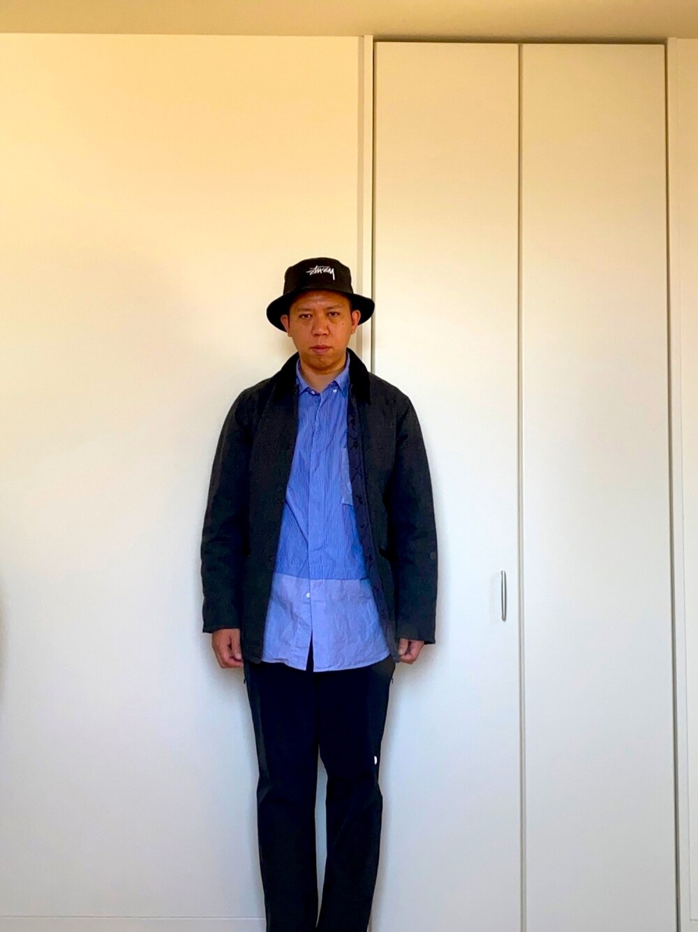 「バケットハット、THE NORTH FACE、UNIQLO、帽子」｜「STUSSYのアイテム（ハット、ブラック系）」を使った、mizsyさん（メンズ・172cm）の冬コーディネートの1枚目の写真