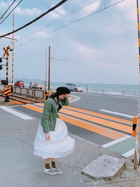 「UNIQLO（ユニクロ）のアイテム（ダウンベスト、グリーン系）」を使った、つきの うさぎさん（レディース・162cm）の春コーディネート