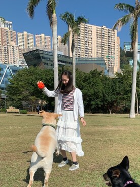 「cotton on（コットンオン）のアイテム（Tシャツ/カットソー、オレンジ系）」を使った、つきの うさぎさん（レディース・162cm）の春コーディネート