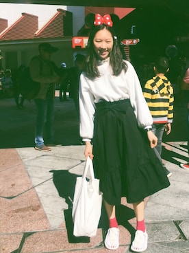 「UNIQLO（ユニクロ）のアイテム（スカート、ブラック系）」を使った、つきの うさぎさん（レディース・162cm）の春コーディネート