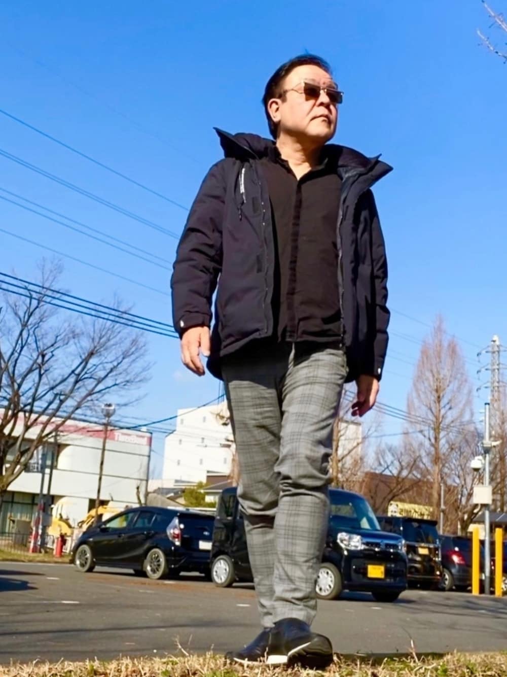 「THE NORTH FACE、大人カジュアル、散歩スタイル、ZARA、PRADA、パンチ、ランボー」｜「THE NORTH FACEのアイテム（ダウンジャケット/コート、ブラック系）」を使った、かつさん（メンズ・174cm）の冬コーディネートの1枚目の写真