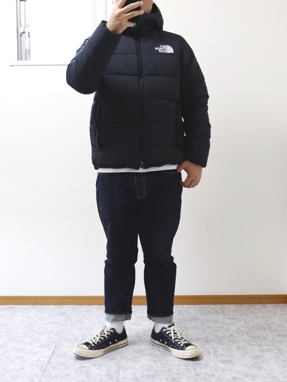 「冬アウター着回しチャレンジ、ノースフェイス、アウターコーデ、ブラック、シンプルコーデ、デニムパンツ」｜「THE NORTH FACEの【THE NORTH FACE / ザ ノースフェイス】 Trango Paka（ブルゾン、ブラック系）」を使った、moomoopaaさん（メンズ・173cm）の冬コーディネートの1枚目の写真
