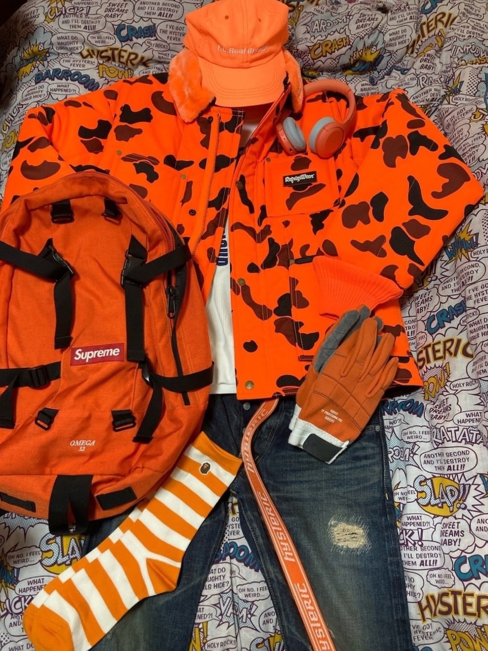 Supreme のスタジャン（オレンジ系）を使った人気ファッション