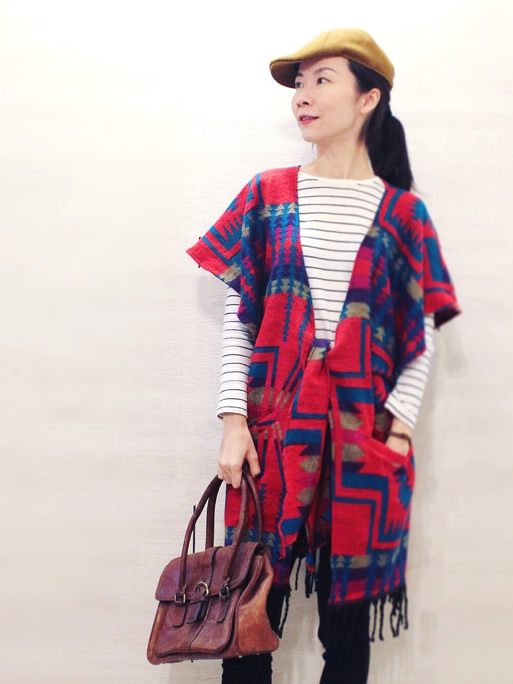 「ginagypsy、wanderlust、madeinindia、taiwanbrand、bohemians、bohochic、poncho、kimono」｜「ginagypsyのアイテム（ポンチョ、オレンジ系）」を使った、Ginaさん（レディース・170cm）の冬コーディネートの1枚目の写真