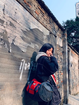 「TOMMY（トミー）のアイテム（バッグ）」を使った、超好吃橘子味的さん（レディース・165cm）の冬コーディネート