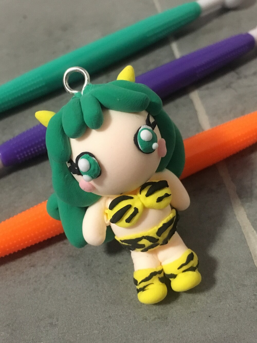 グリーン系のおもちゃを着用したレディースの秋コーディネートの1枚目の写真