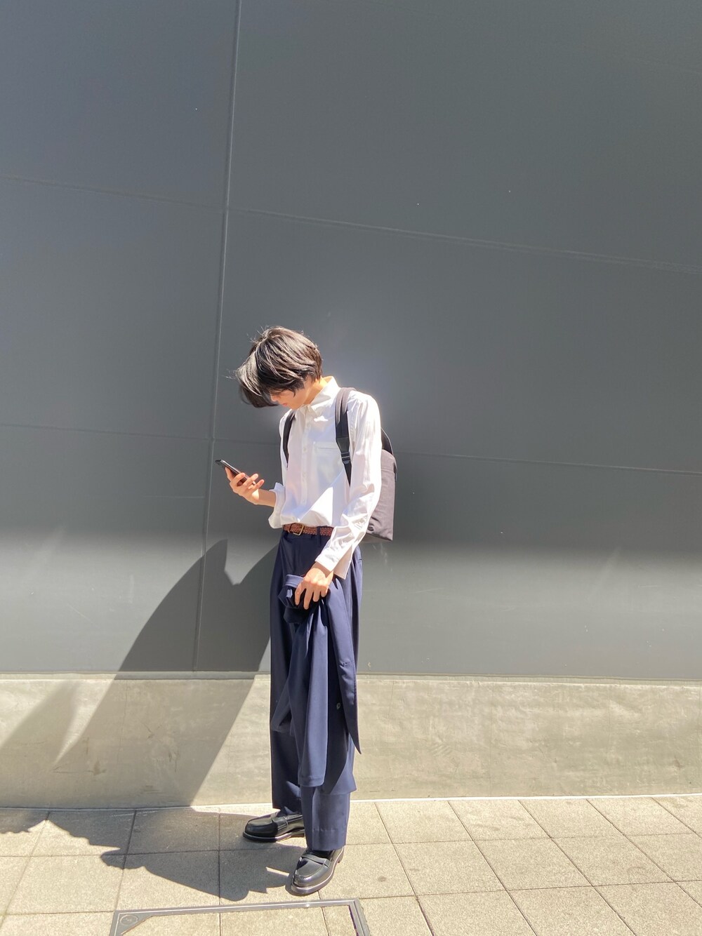 「UNITED TOKYO」｜「UNITED TOKYOのドルフィンCobraバックルバックパック（バックパック/リュック、ブラック系）」を使った、kimuraさん（メンズ・184cm）の春コーディネートの1枚目の写真