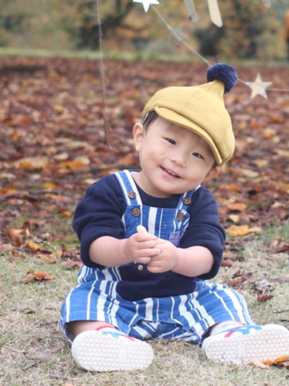 「little grin buddyのアイテム（帽子、イエロー系）」を使った、ARATA☻*さん（キッズ・80cm）の冬コーディネートの1枚目の写真