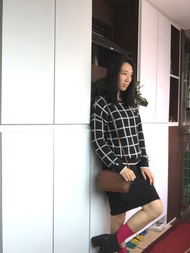 「アイテム（ブーティ）」を使った、Yvonne Ngさん（レディース・168cm・30代）の冬コーディネート