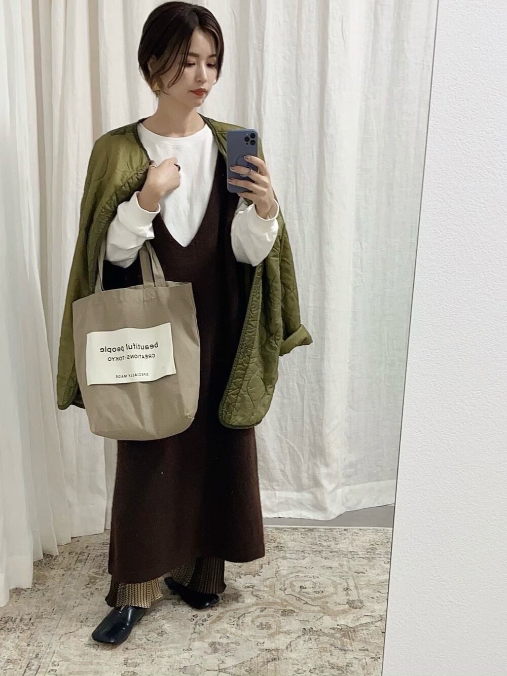 「ライナーコート、ロングベスト、柄パンツ、パンツスタイル、レイヤードスタイル、冬コーデ」｜「CFT.のアイテム（ジャケット/アウター、グリーン系）」を使った、yosさん（レディース・163cm）の冬コーディネートの1枚目の写真