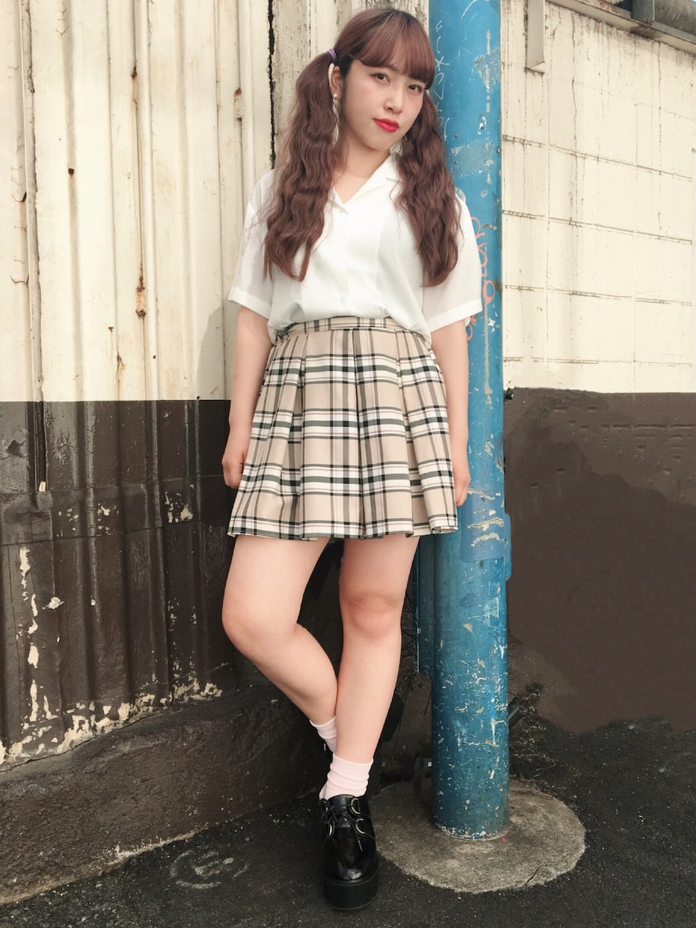 チェック柄プリーツミニスカートを使った人気ファッション