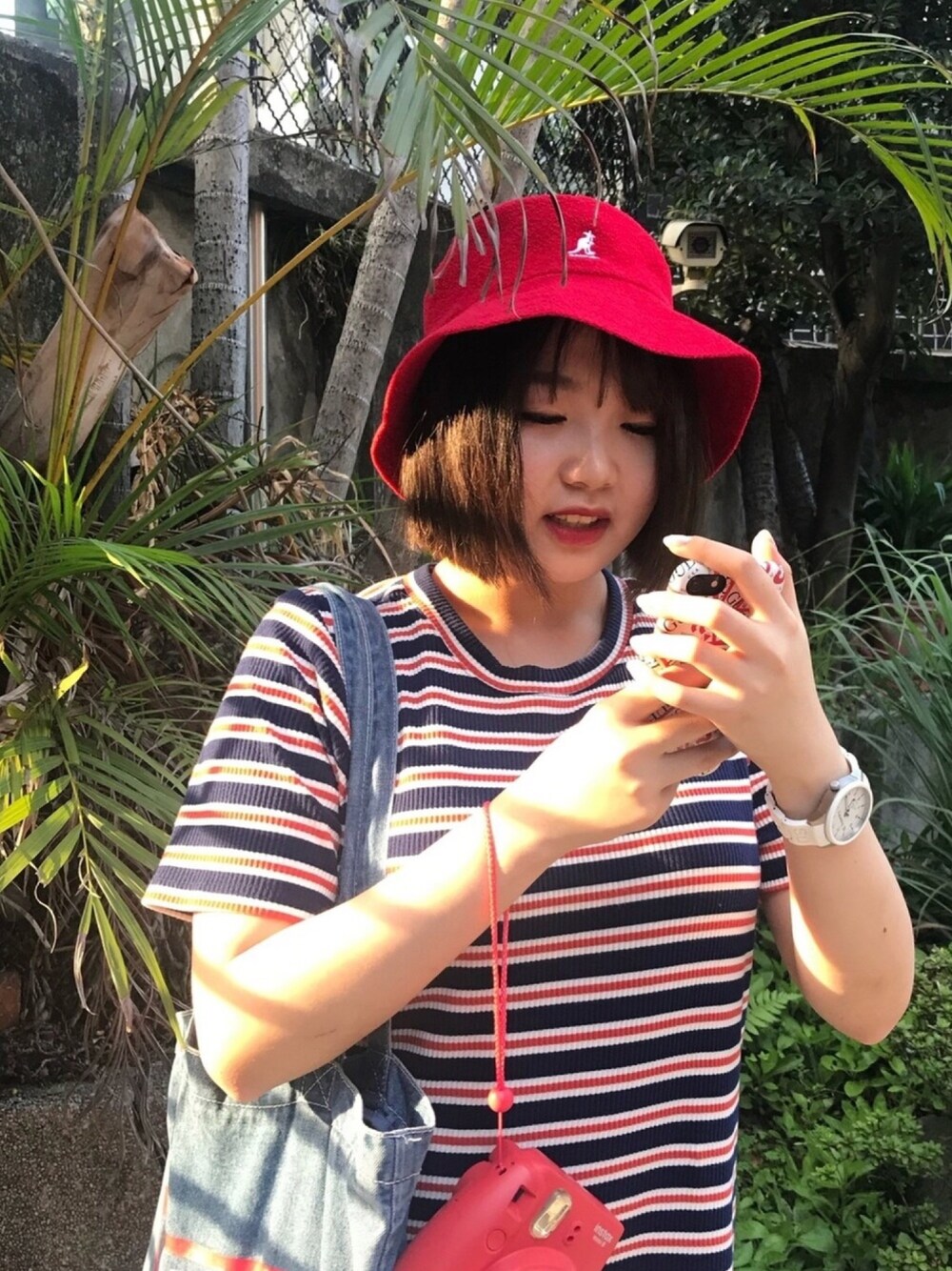 「台湾、台北」｜「KANGOLのアイテム（帽子、レッド系）」を使った、蓉さん（レディース・153cm）の冬コーディネートの1枚目の写真
