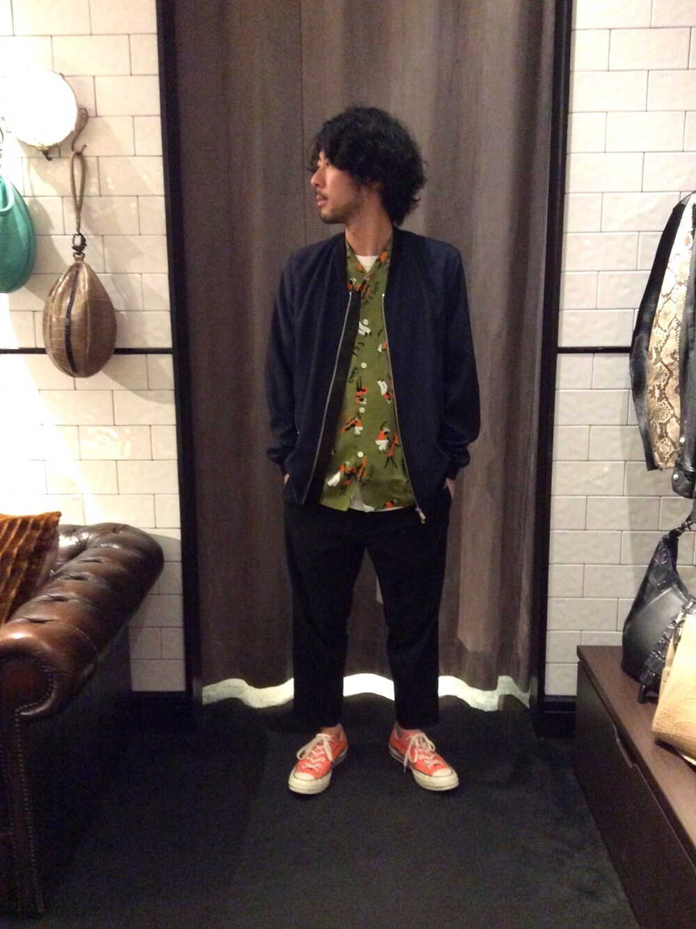 ブルー系のブルゾンを着用したメンズの夏コーディネートの1枚目の写真