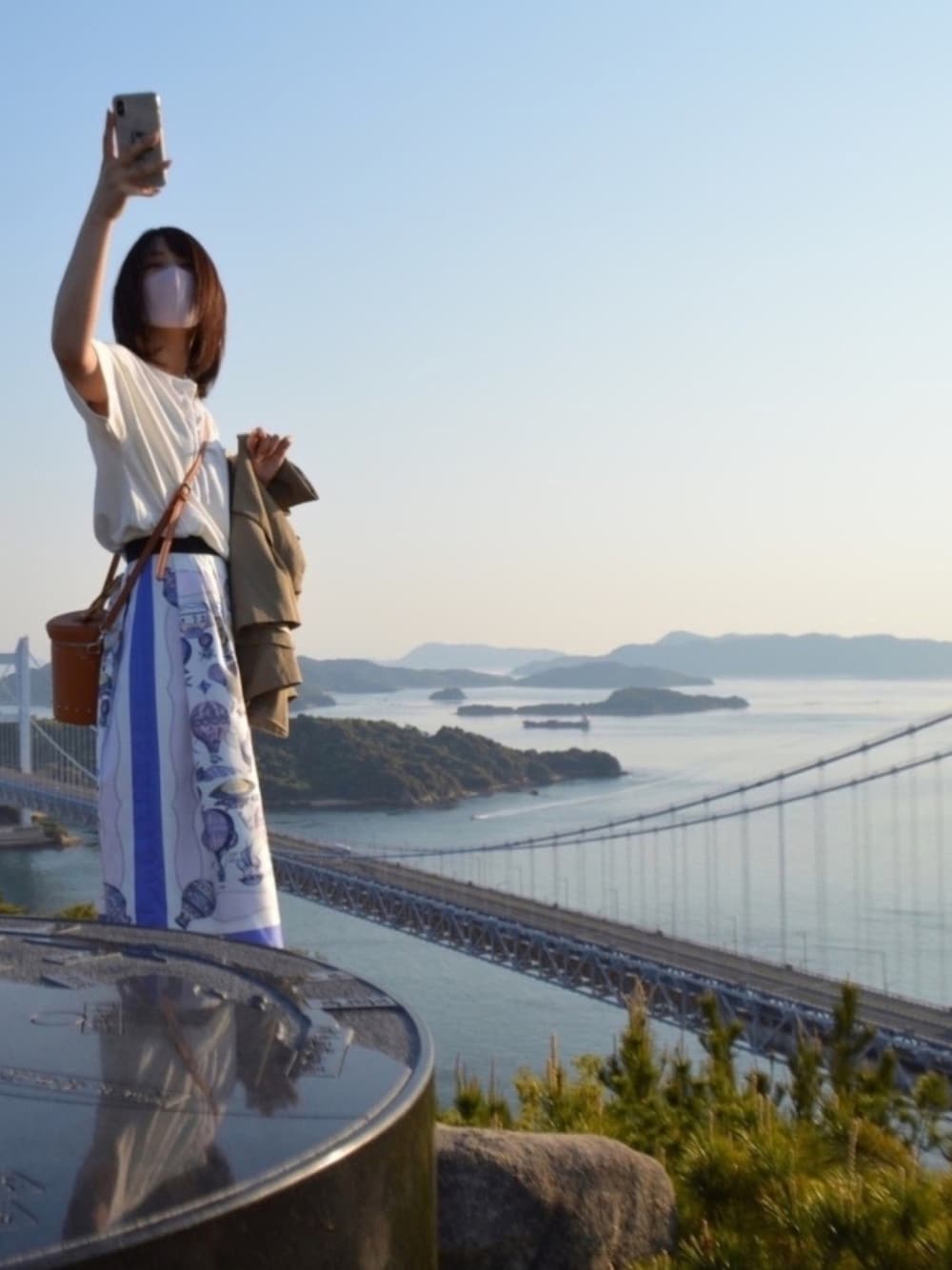 「瀬戸大橋、ドライブ」｜「ROPE'のプリント×無地ラップスカート（スカート、ブルー系）」を使った、ナナメさん（レディース・155cm）の春コーディネートの1枚目の写真