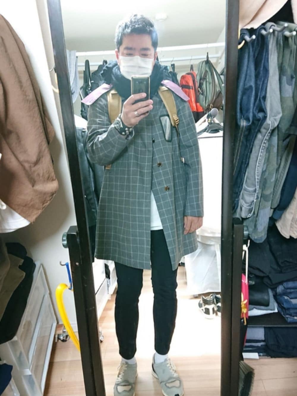 「UNDERCOVERのアイテム（アナログ腕時計、ブラック系）」を使った、高さん（メンズ・176cm）の冬コーディネートの1枚目の写真
