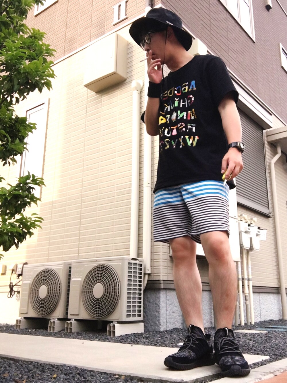 「シンプル、プチプラコーデ、UNIQLO、adidas originals、G-SHOCK、THE NORTH FACE、おしゃれさんと繋がりたい、ボーダー」｜「UNIQLOのアイテム（Tシャツ/カットソー、ブラック系）」を使った、ゆうすけさん（メンズ・176cm）の春コーディネートの1枚目の写真