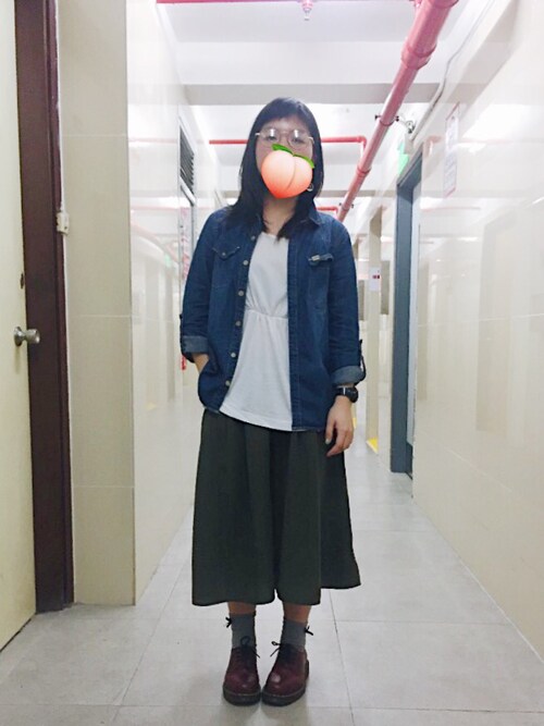 Melissa is wearing Dr. Martens "Dr Martens 1461 Cherry Red 3-Eye Flat Shoes - Cherry red"