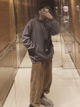 「アイテム（チノパンツ、オレンジ系）」を使った、🇭🇰IG: Ts._.1926 さん（メンズ・175cm）の冬コーディネート