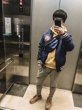 「アイテム（イエロー系）」を使った、Apanさん（メンズ・176cm）の冬コーディネート