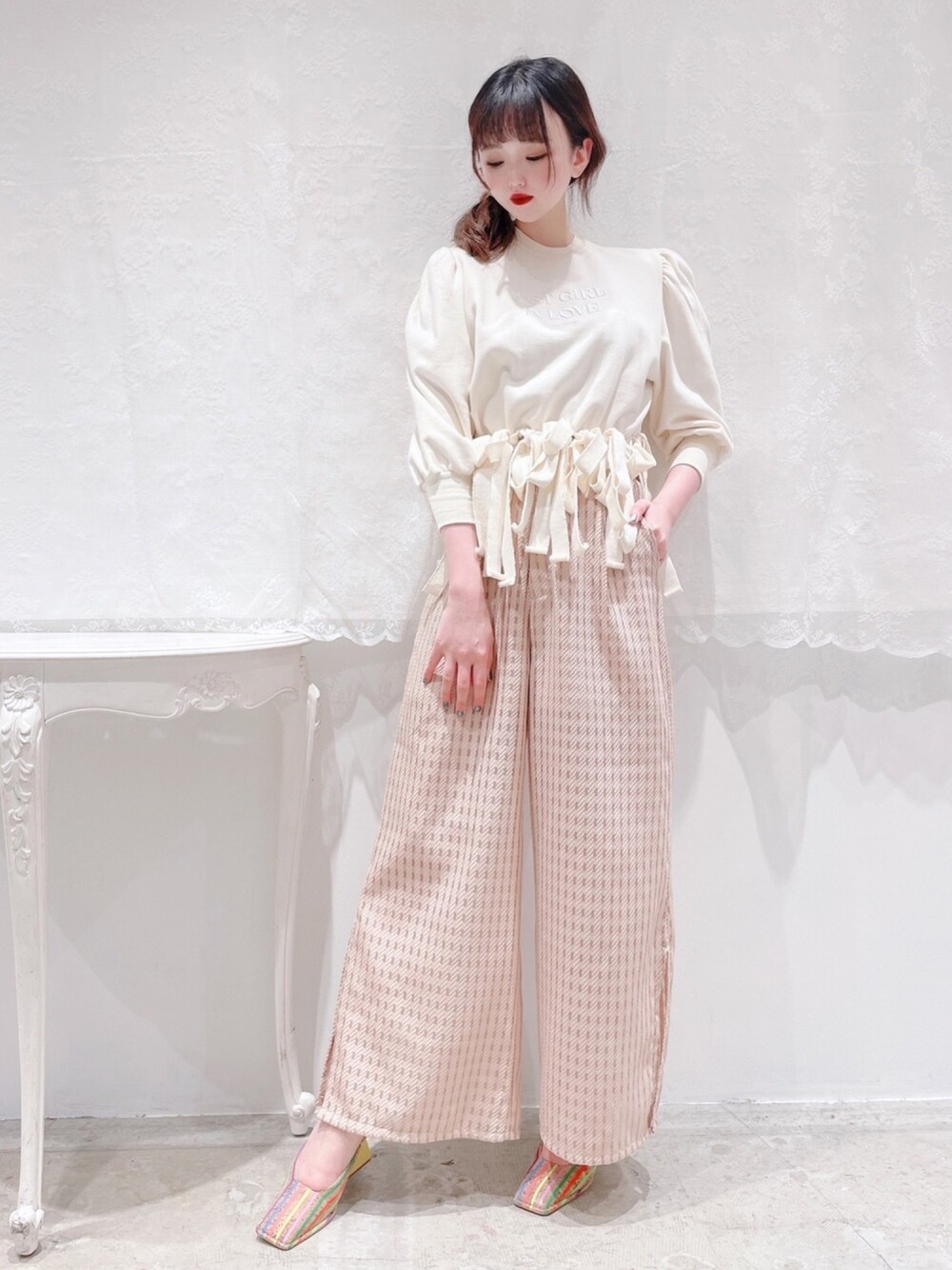 lilLilly りぼんフリンジスウェットトップス lilLilly（リルリリー）の「リボンフリンジスウェットトップス