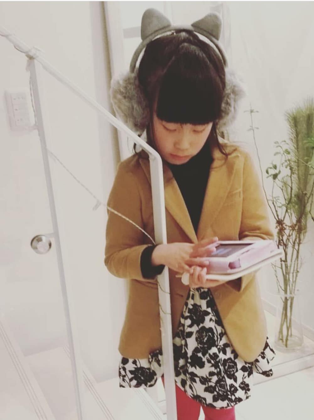 「DAISOのアイテム（イヤーマフ、グレー系）」を使った、nekoさん（キッズ・122cm）の冬コーディネートの1枚目の写真