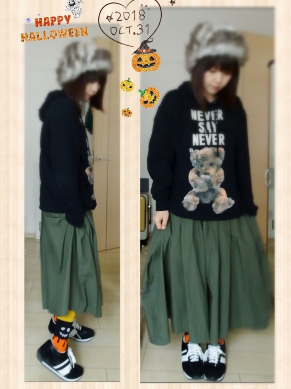 ブラック系のパーカー、グリーン系のその他パンツ、ブラック系のスニーカーを着用したレディースの秋コーディネートの1枚目の写真