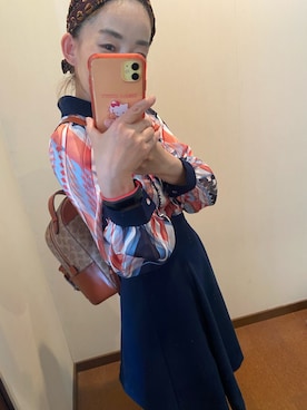 「COACH（コーチ）のアイテム（バックパック/リュック、ブラウン系）」を使った、岡崎   智さん（レディース）の夏コーディネート