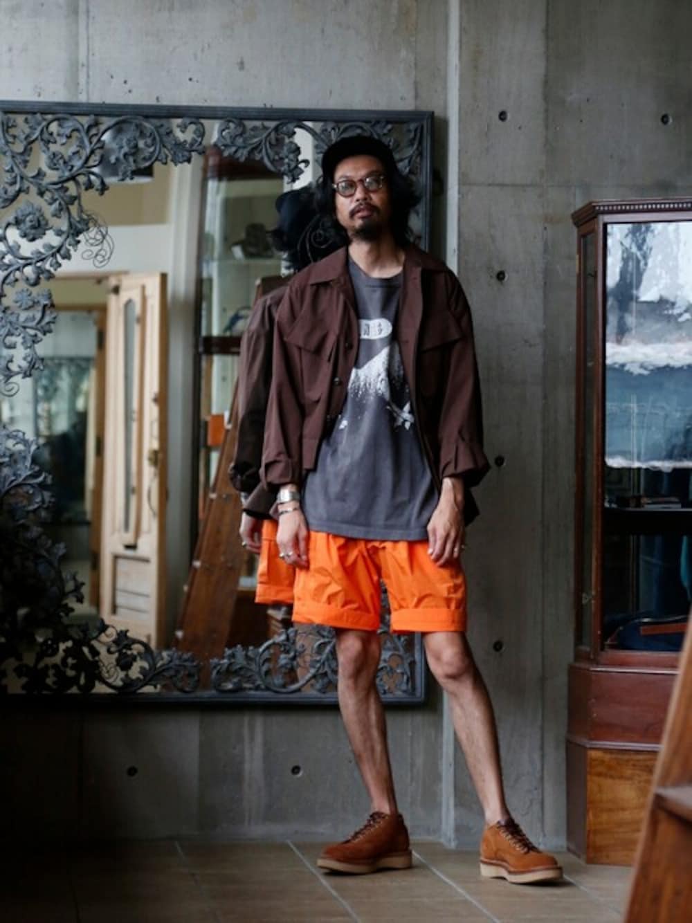 「gold、ハーフパンツ、ショーツ、ミックススタイル、COMESANDGOES、marka、whitesboots、Cooperstown Ball Cap、JULIUS TART OPTICAL、saint michael」｜「markaのmarka / マーカ：JUNGLE FATIGUE JACKET - organic cotton compact silk weather -：M21C-02BL01C[COR]（ミリタリージャケット、ブラウン系）」を使った、ARKnets STAFFさん（メンズ・183cm）の夏コーディネートの1枚目の写真