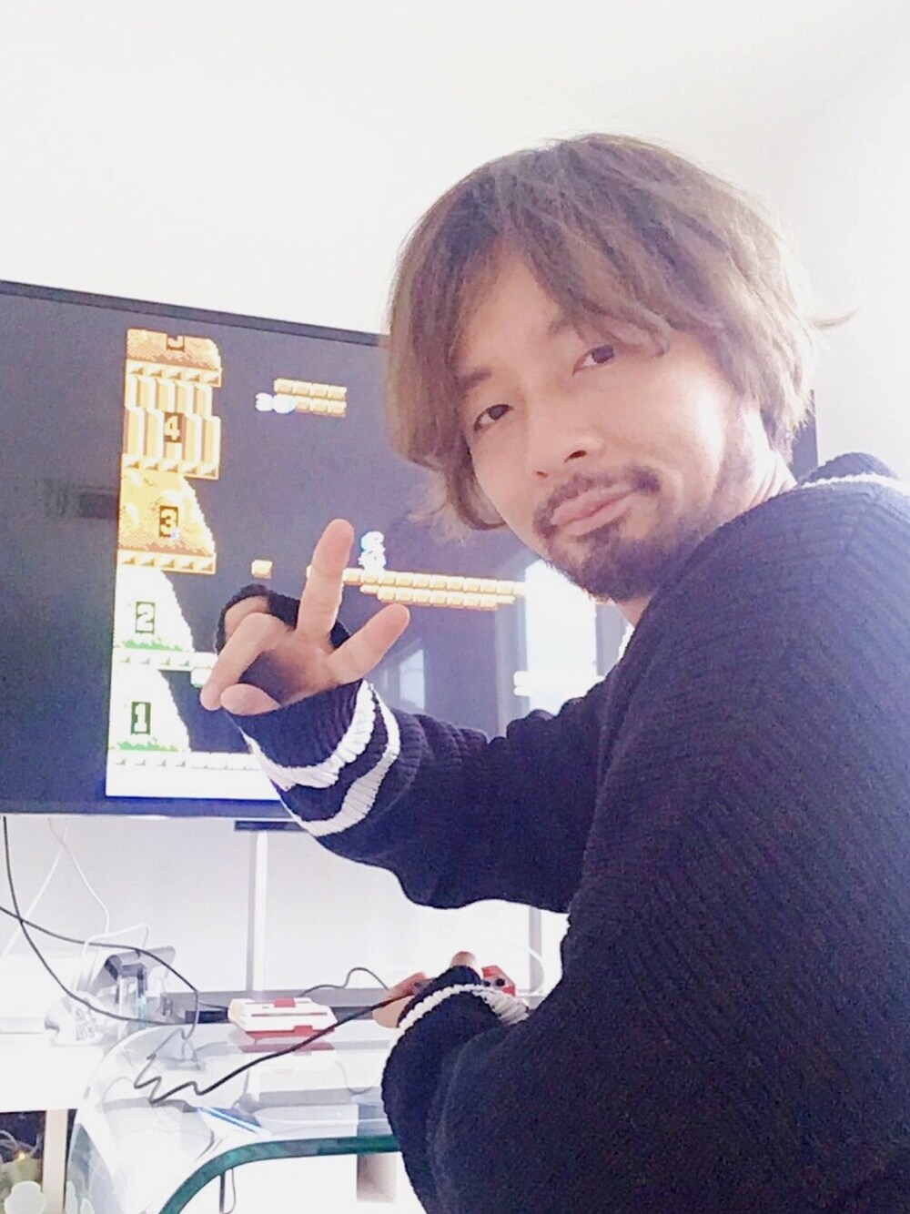 「ラブアンドピース2018、ゆるコーデ、ZARA、ザラ、チルデンニット、ニット、チェックパンツ、tree cafe、秋のコーデ、秋コーデ」｜「ZARAのアイテム（ニット/セーター、ブラック系）」を使った、ましゃしさん（メンズ・174cm）の秋コーディネートの1枚目の写真