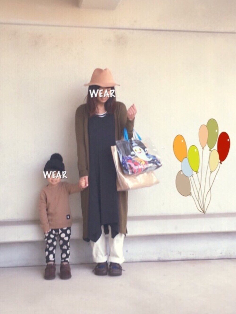 グリーン系のカーディガン/ボレロ、ブラック系のワンピース、ホワイト系のその他パンツを着用したレディースの冬コーディネートの1枚目の写真