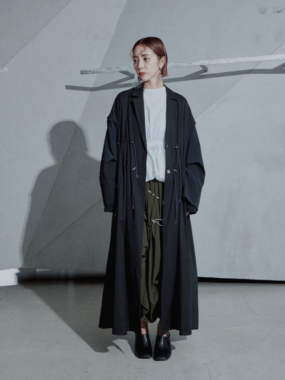 UN3D.（アンスリード）の「ドローストリングコート（その他アウター