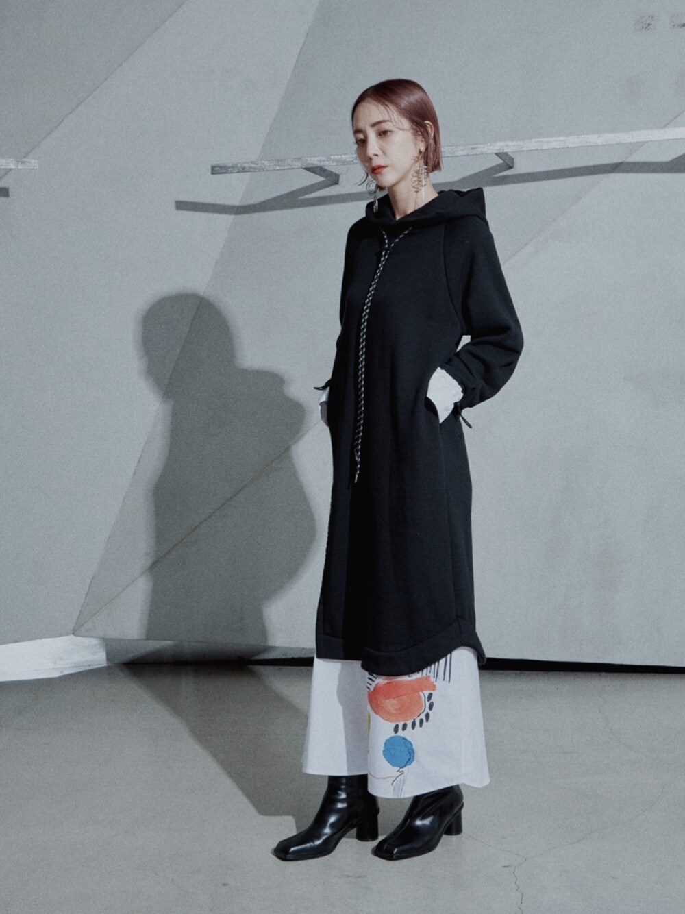 UN3D.（アンスリード）の「アートドッキングスウェットワンピース