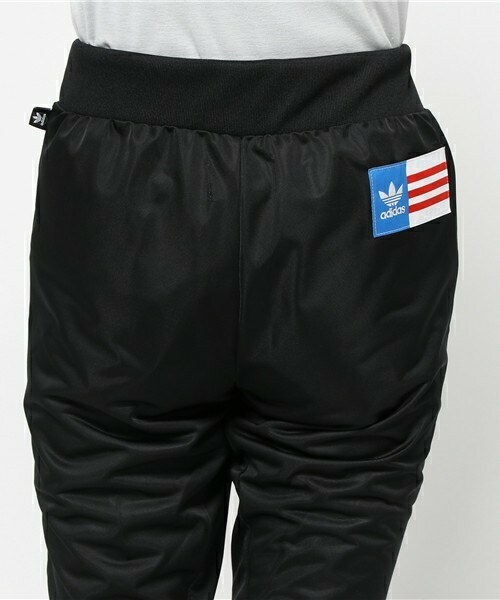 正品 adidas アディダスウーマンズR.Y.Vトラックパンツ adidas（アディダス）の「R.Y.V. トラックパンツ [TRACK PANTS