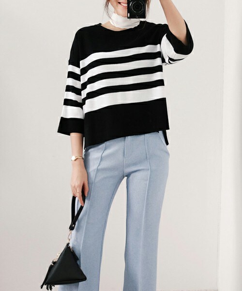 DHOLIC（ディーホリック）の「アンバランスヘムボーダーパターンニットプルオーバー（ニット/セーター・レディース・ホワイト/ブラック・FREE）」の2枚目の写真