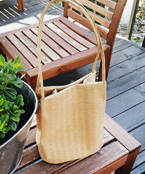 DHOLIC（ディーホリック）の「レザー調バケットトートバッグ（トートバッグ・レディース・ブラウン/ベージュ・FREE）」の2枚目の写真