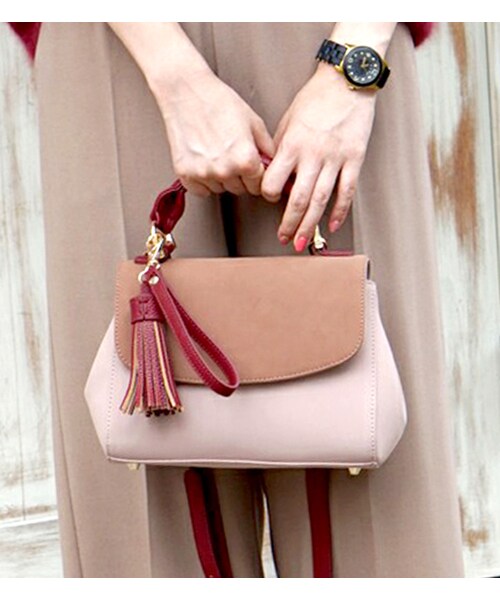 laboratory work(ラボラトリーワーク)の「フリンジ付き2wayバッグ(バッグ・レディース・レッド系/オレンジ系/グリーン系)」の1枚目の写真