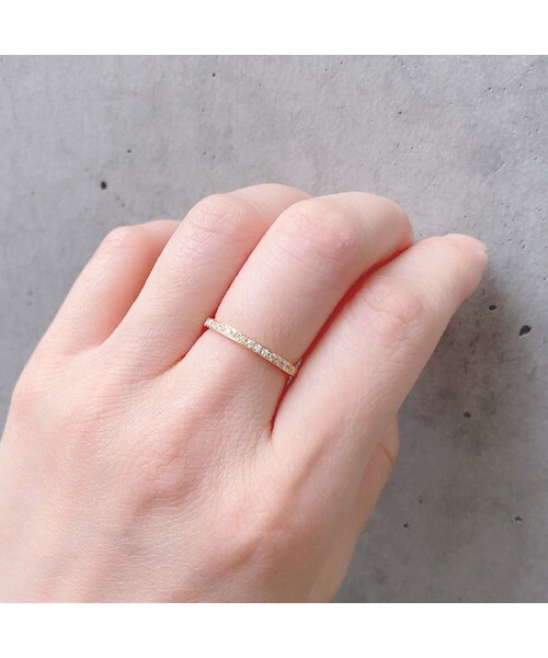 pinacoteca（ピナコテーカ）の「ピナコテーカ 440アトラクテッド ダイヤモンド ハーフ エタニティ リング 0.12ct（リング・レディース・ゴールド・5号〜13号）」の3枚目の写真