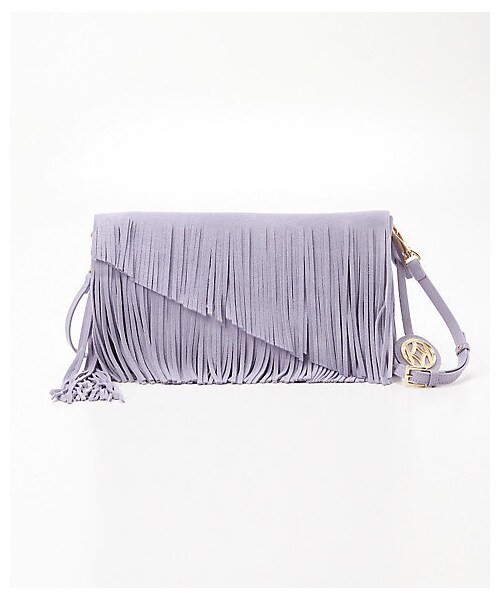 マルヤマケイタさんのクラッチバッグです。アフリカンな装いでプラス