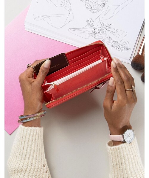 Ted Baker(テッドベーカー)の「Ted Baker Zip Around Heart Matinee Wallet(財布・レディース・Orange・One Size)」の2枚目の写真