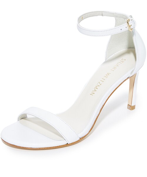 STUART WEITZMAN(スチュアートワイツマン)の「Stuart Weitzman Nunakedstraight Sandals(ドレスシューズ・レディース・White・4/4.5/5/5.5/6/6.5/7/7.5/8/8.5/9/9.5/10)」の1枚目の写真