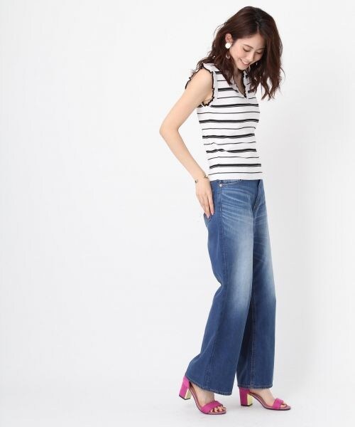 Andemiu（アンデミュウ）の「アクセツキフリルスリーブニット（トップス・アイボリー/ベージュ）」の4枚目の写真